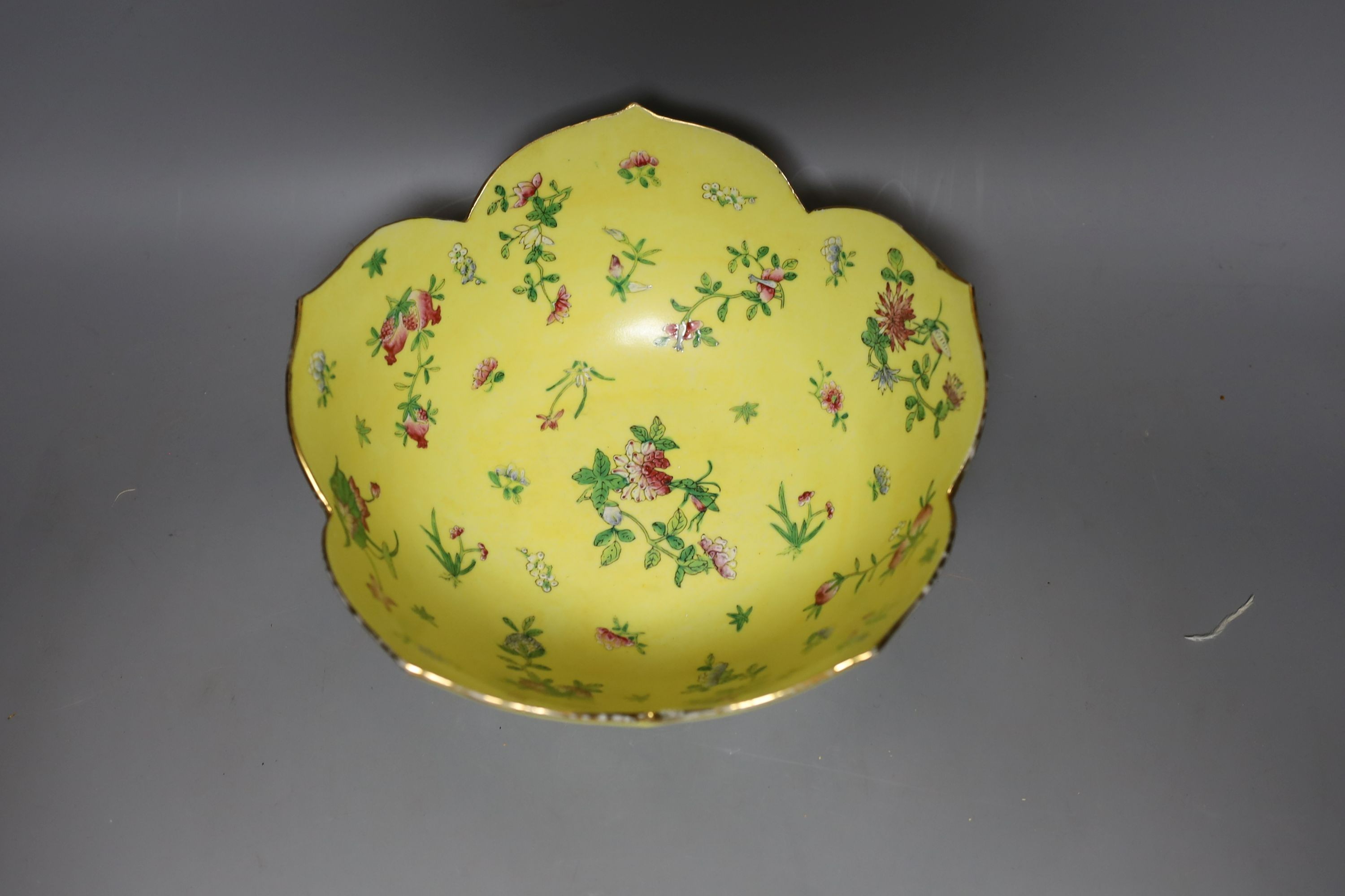 A mid 20th century Chinese yellow ground lotus petalled lobed bowl - 24cm diameter